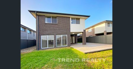 Spacious Family Home In Heart of Elara Estate - Photo 3