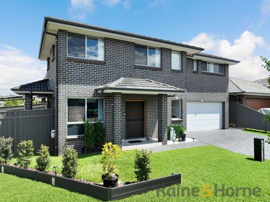 Modern Double-Storey Living in a Prime Gregory Hills Location - Photo 1