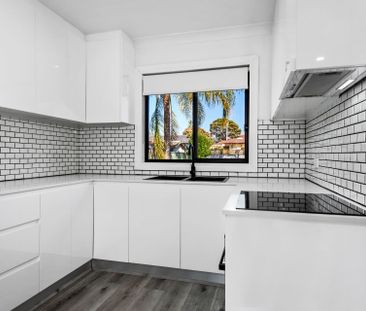 RENOVATED THREE BEDROOM HOME! - Photo 2