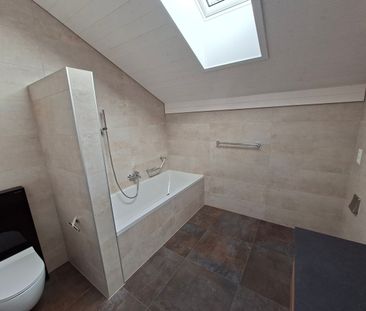 Grand appartement de 4,5 pièces sous les combles et proche de la gare - Photo 4