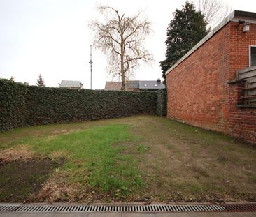 Ruime woning met 3 slaapkamers en tuin midden in het centrum - Photo 4