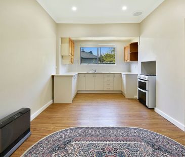 Charming Refreshed Cottage in a Convenient Location - Photo 4