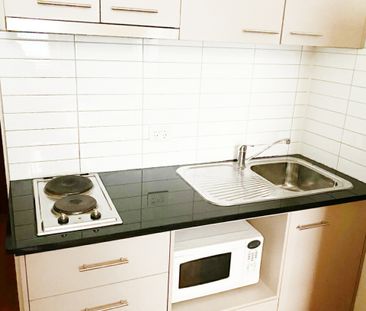 Fully Furnished studio with all you need - Six Months Lease Only! - Photo 3