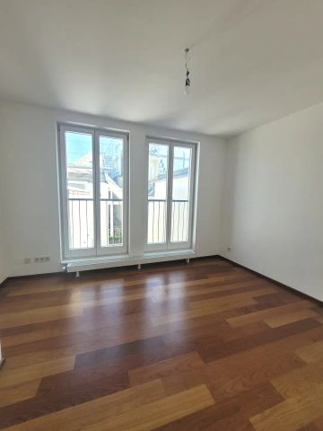 Großzügig angelegte Dachgeschoss Maisonette mit ca. 70qm Terrasse - Photo 2