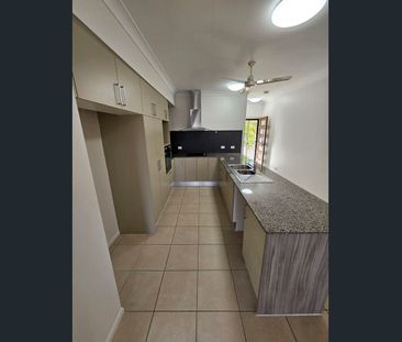 Spacious Four-Bedroom Home with Media Room & Air Conditioning - Photo 1