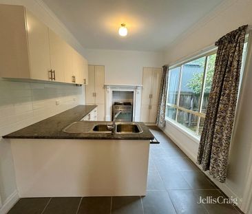 Charming Four Bedroom Home in Prime Location - Photo 5