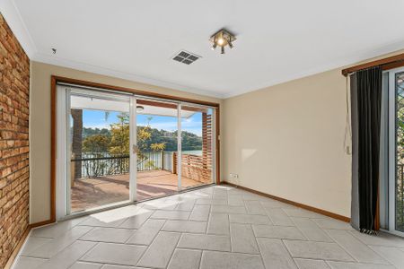 Peaceful Retreat with Stunning Water Views&excl; - Photo 5