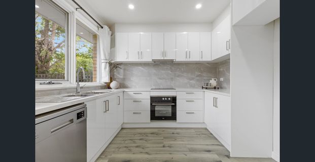 Recently Renovated and Ready to Enjoy - Garden Maintenance Included - Photo 1