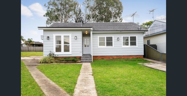 Renovated 3 Bedroom Home - Photo 1