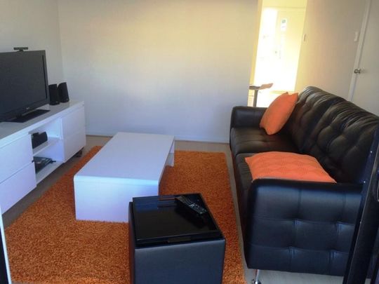 Three Bedroom Townhouse in Excellent Location - Photo 1