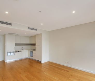 North Facing Bedroom with New Appliances and Floorboards! - Photo 4