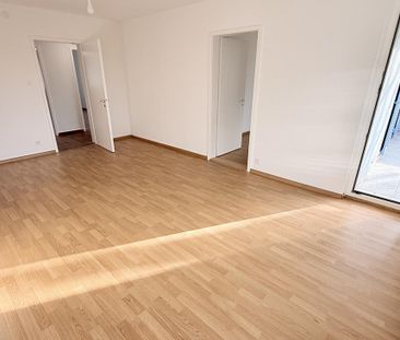 Wohnen im Grünen – Grosszügige Familienwohnung in den Langen Erlen - Foto 1