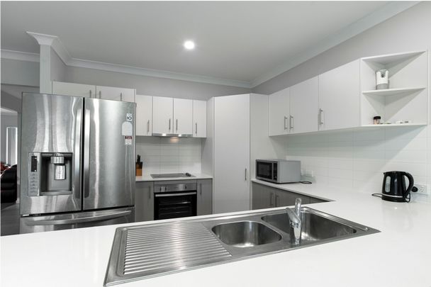 Prime Location - 2 Min drive to Bellbird Park Secondary College - Photo 1