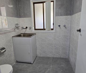 Modern Four Bedroom In a Convenient Location! - Photo 2