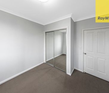 Spacious Tri-Level Townhouse - Light-Filled and Conveniently Located - Photo 2