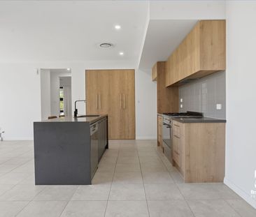 Stylish Townhouse in Sought-After Estate with Bushland Views - Photo 6