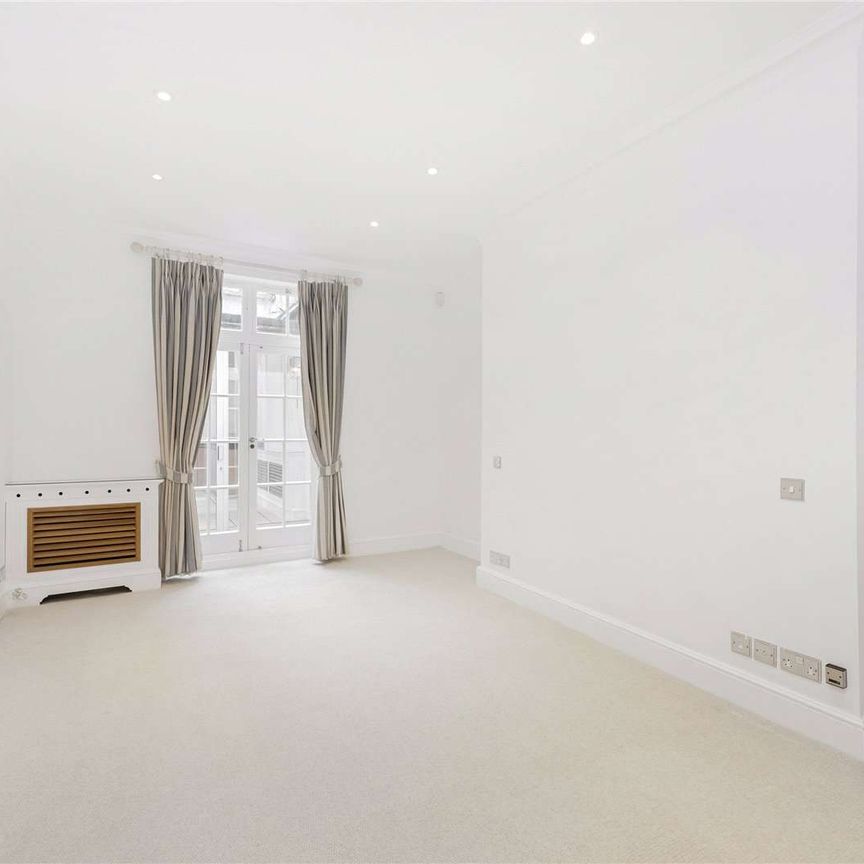 A two bedroom apartment that offers a wonderful high ceilinged reception room as well as a contemporary styled kitchen. - Photo 1