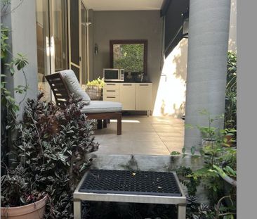 Fabulous Fully Furnished Garden Apartment In Ideal Location - Photo 1