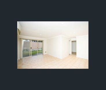A Bright Three Bedroom Home with Its Own Courtyard - Photo 1