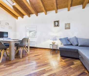 Appartamento arredato di 1½ locali con soppalco e vista sul Lago di... - Photo 1