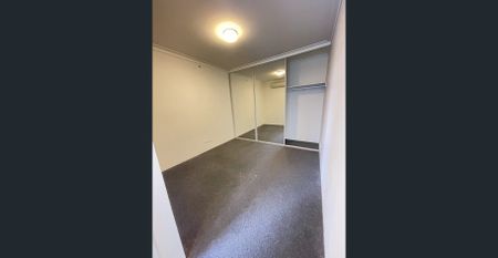 Top Floor Premium 2-Bedroom, 2-Bathroom Apartment with 1 Car Park - Photo 4