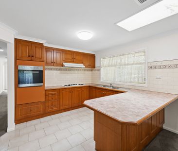 Refreshed Four-Bedroom Home With Gated Side Access - Photo 4