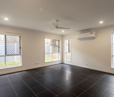 Beautiful family home in the thriving Providence Estate! - Photo 1