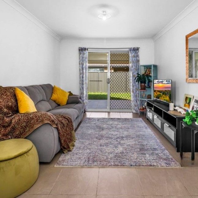 STUNNING FAMILY HOME WITH A BEAUTIFUL BACKYARD! - Photo 1