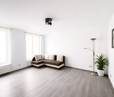 Przestronna kawalerka w centrum miasta - Zdjęcie 1