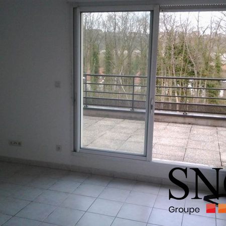 T2 AVEC BALCON ET PLACE DE PARKING - Photo 3