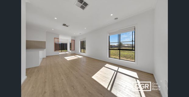 Discover Modern Elegance and Family Comfort in the Heart of Wollert! - Photo 1