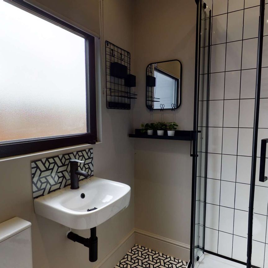 Join a stunning co-living home near the heart of the city, designed for aspirational living and vibrant community. Room E - Photo 1