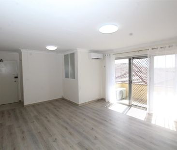 MODERN APARTMENT OFFERING COMFORT, SPACE & UNBEATABLE CONVENIENCE - Photo 6