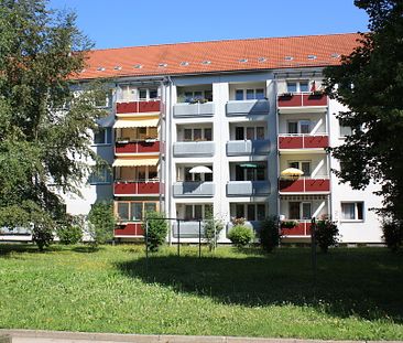 Mit Blick ins Grüne gelegene 2-Raum-Wohnung mit Balkon - Foto 1