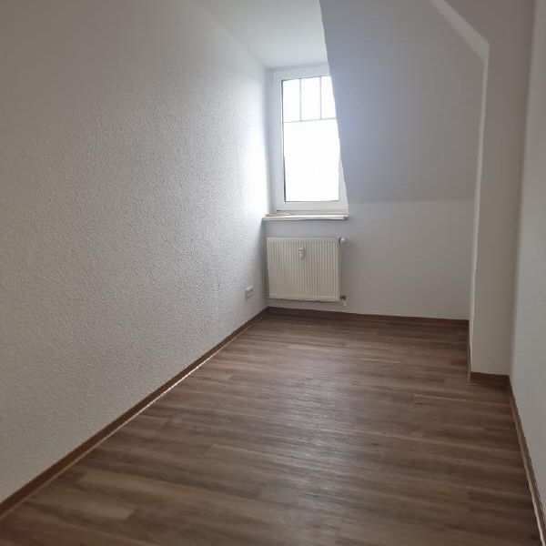 Gemütliche Dachgeschosswohnung in der Südstadt! - Photo 1
