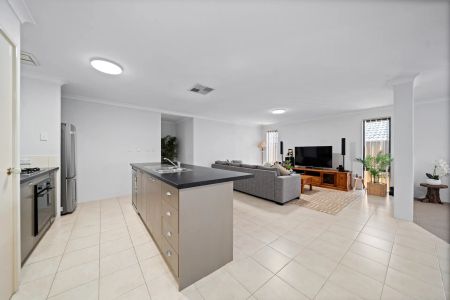 Immaculate 4x2 Family Home with Multiple Living Areas - Photo 3