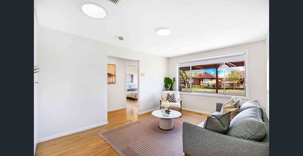 Comfortable Family Living with Extra Storage & Great Outdoor Space - Photo 1