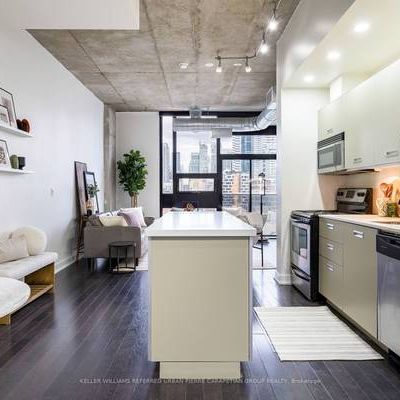 Floor to ceiling windows + den parking included! - Photo 4