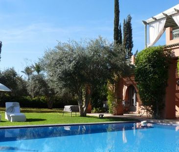 Maison au coeur d'un jardin luxuriant dans la Palmeraie de Marrakech - Photo 1