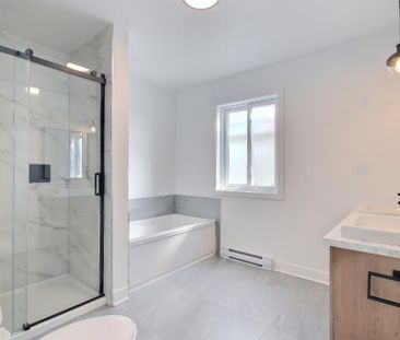 5 1/2 STYLE CONDO SUR 2 NIVEAUX RÉNOVÉ À ST-JÉRÔME - Photo 4