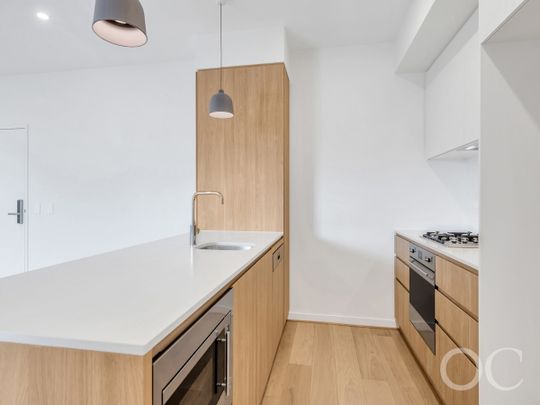 Open the Door to Top-Floor Luxury with Sweeping City & Coastal Views - Photo 1