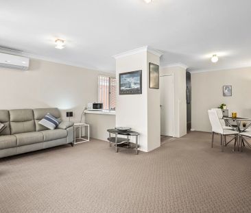 Low-maintenance coastal living in the heart of Rockingham. - Photo 4