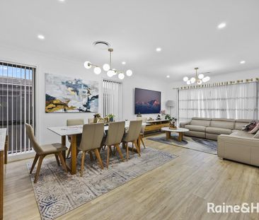 Spacious & Stylish Family Living with Multiple Living Areas - Photo 5