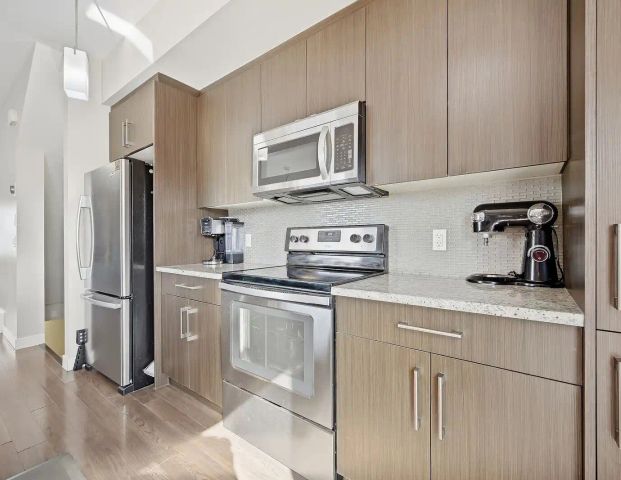 3 Bedroom Corner unit Townhome Near Ted Harrison School — 3 Bedrooms+ Den Townhouse - Photo 1
