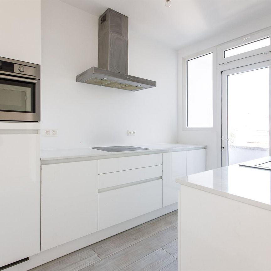 Vernieuwd appartement met terras - Photo 1