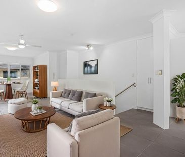 Renovated Split-Level Apartment with Tandem Garage *Water bills inc... - Photo 2