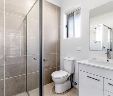 Modern & Affordable 4 Bedroom Home - Photo 4