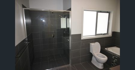 MODERN TWO BEDROOM UNIT WITH DOUBLE GARAGE - Photo 2