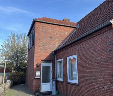 Oberwohnung mit ausreichend Platz in Moormerland-Warsingsfehn! - Photo 1