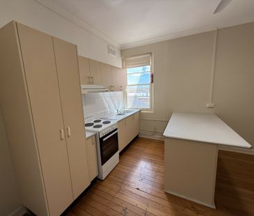 Charming Two Bedroom "Above Shop" Apartment!! - Photo 4